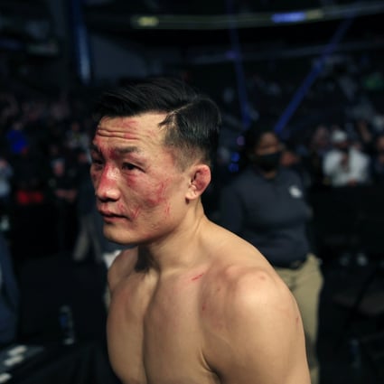 Chan Sung Jung, better known as “the Korean Zombie,” leaves the arena after defeated by Alexander Volkanovski in the fourth round in the featherweight title bout at UFC 273 in Jacksonville, Fla., Saturday, April 9, 2022. Photo: Corey Perrine/The Florida Times-Union via AP