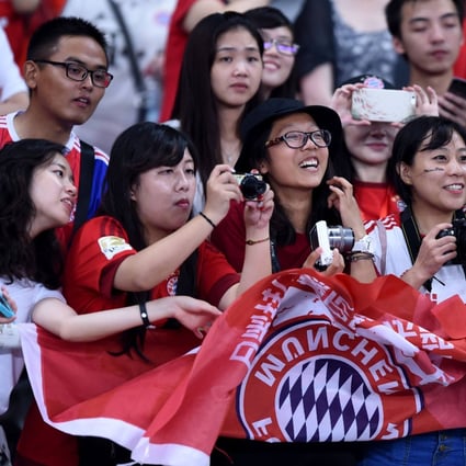 Bayern Munich fans from China at a pre-season team training session event in Shanghai. Photo: AFP   