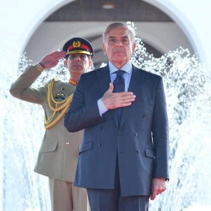 Pakistan’s new Prime Minister Shehbaz Sharif gestures during a guard of honour ceremony in Islamabad on Tuesday. Photo: Pakistan Press Information Department Handout via Reuters 