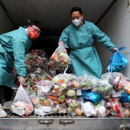 Shanghai residents are banding together to find food as other sources dry up. Photo: Reuters