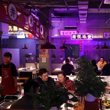 People dine at a hotpot restaurant in Beijing on April 8. Chinese policymakers must convince consumers to go out and spend money if they hope to sustain economic growth at a time of increasing global headwinds. Photo: Reuters
