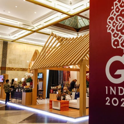 Officials prepare the exhibition stands at the venue for the G20 finance ministers and central governors meeting in Jakarta in February. Photo: POOL AFP\