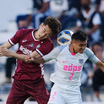 Vissel Kobe’s Yuki Kobayashi in action with Kitchee’s Tsz Chun Law during the AFC Champions League Group J match. Photo: Reuters