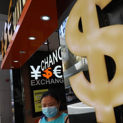 Dollar sign seen at a currency exchange booth in Hong Kong’s Tsim Sha Tsui area on 11June 2020. Photo: Sam Tsang