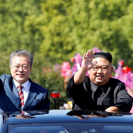 North Korean leader Kim Jong-un (right) and South Korean President Moon Jae-in at a car parade in Pyongyang. File photo: Reuters
