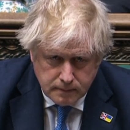 Britain’s Prime Minister Boris Johnson reacts after apologising to MPs for the for his “partygate” fine in the House of Commons in London on Tuesday. Photo: PRU via AFP