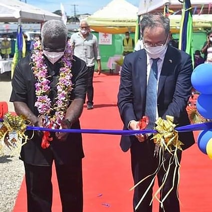 Solomon Islands Prime Minister Manasseh Sogavare (left) and China’s ambassador to the Solomon Islands Li Ming at the opening ceremony of a China-financed national stadium complex in Honiara on Friday. The stadium complex, worth a reported US$53 million, will host the 2023 Pacific Games, a first for the Solomons. Photo: AFP