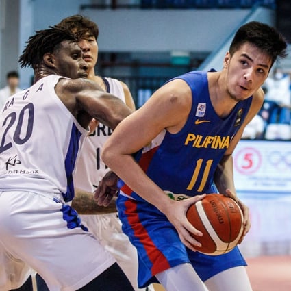 Kai Sotto of the Philippines in action against Guna Ra of South Korea during the FIBA Asia Cup 2021 qualifiers. Photo: EPA-EFE