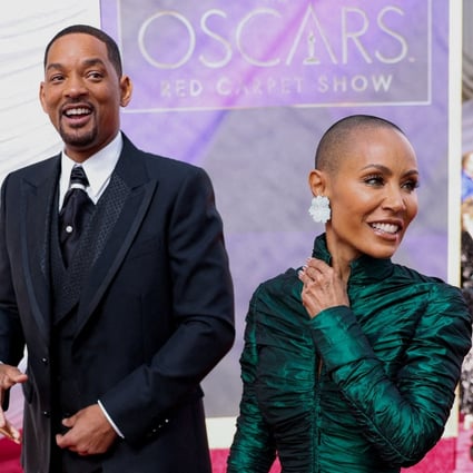 Will Smith and his wife Jada Pinkett-Smith at the Academy Awards ceremony in Los Angeles on March 27. Photo: Reuters