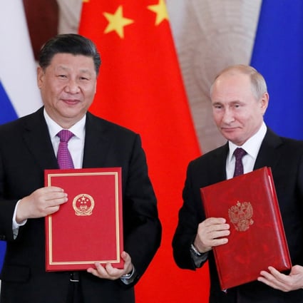 Russian and Chinese Presidents Vladimir Putin and Xi Jinping pose after a signing ceremony in Moscow on June 5, 2019. Photo: Reuters