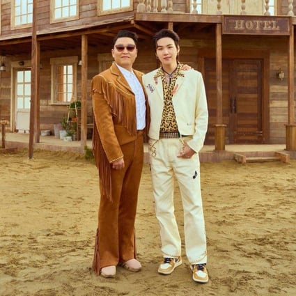 Psy (left) and Suga of K-pop boy band BTS. Suga is the featured artist on – and producer of – Psy’s new song That That.