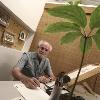 Mark Isaac-Williams at an exhibition of his paintings at Kadoorie Farm and Botanic Garden, where he worked on and off for decades after growing up in post-war Hong Kong. Photo: Jonathan Wong