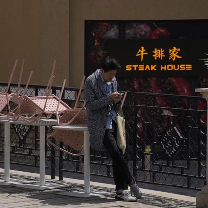 Restaurants in Beijing have been banned from offering dine-in services during the Labour Day break. Photo: AP