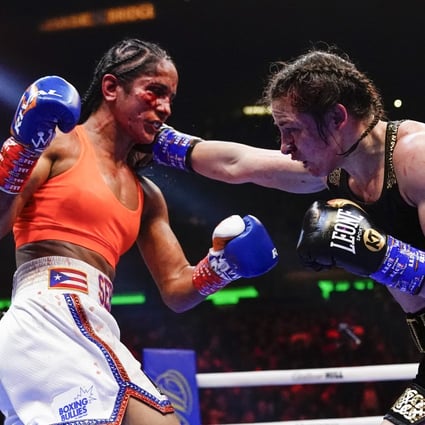 Ireland’s Katie Taylor punches Amanda Serrano during the 10th round of their lightweight championship boxing bout on April 30, 2022, in New York. Photo: AP/Frank Franklin II