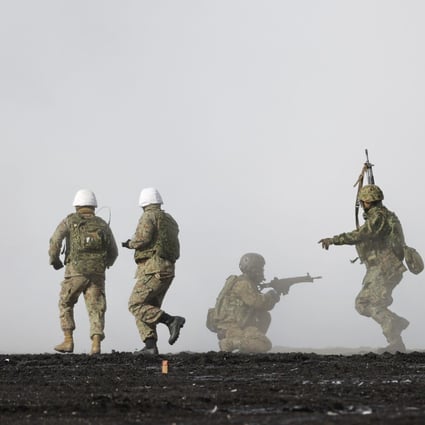 Personnel of the Japan Ground Self-Defense Force amphibious rapid deployment unit take part in a joint amphibious exercise with the US Marine Corps in March. Photo: Kyodo