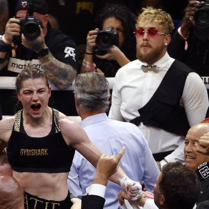 Irish boxer Katie Taylor (centre) celebrates after winning by a split decision to retain the undisputed world lightweight championship over Amanda Serrano at Madison Square Garden. Photo: EPA-EFE