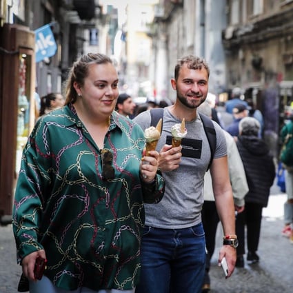 People in Naples, southern Italy on the day when new Covid-19 rules came into force. Photo: EPA-EFE
