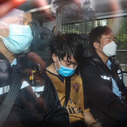Ng Ka-sing (centre) appeared before Tuen Mun Court on Monday morning to face a count of murder. Photo: Yik Yeung-man