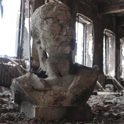 A destroyed bust can be seen in a hall at the Museum of Local Lore that burned down after shelling in an area controlled by Russian-backed separatist forces in Mariupol, eastern Ukraine, on April 28. Photo: AP