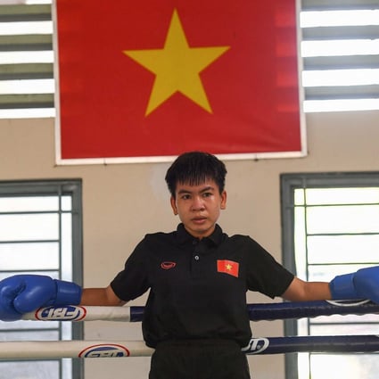 Nguyen Thi Thu Nhi, Vietnam’s first world boxing champion, takes a break during a training session at the Ho Chi Minh City National Sports Training Centre in Ho Chi Minh City. Photo: AFP
