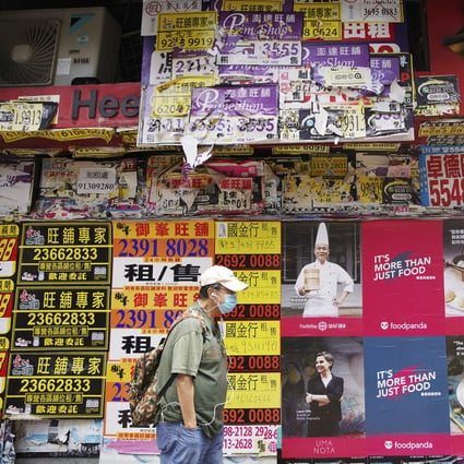 A man walked past a closed retail shop in Causeway Bay on 27 June 2020. Photo: Winson Wong