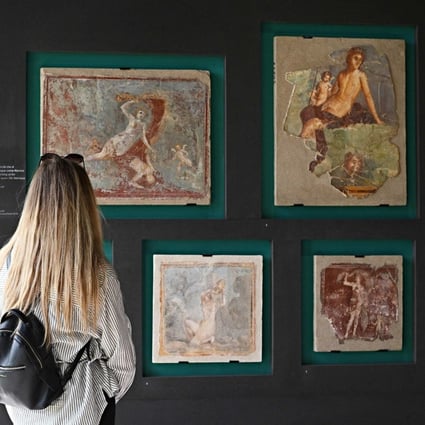 “Art and Sensuality in the Houses of Pompeii” is a new exhibition featuring erotic sculptures and mosaics from the ancient Roman city. Photo: Andreas Solaro/AFP