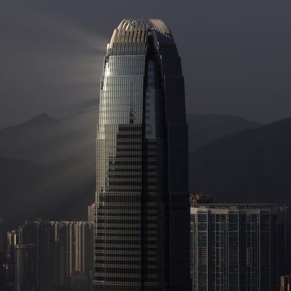 Light rays emerge from the International Finance Centre in Hong Kong’s Central business district in October 2021. Photo: Nora Tam