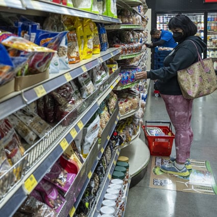 A woman shops at a grocery store in San Francisco on May 2. US inflation has continued to rise to levels not seen in decades. Photo: Bloomberg