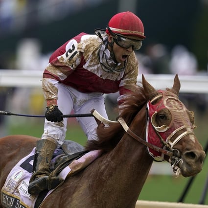 Sonny Leon celebrates after riding Rich Strike past the finish line to win the 148th running of the Kentucky Derby horse race at Churchill Downs in Louisville, Kentucky on Saturday. Photo: AP 