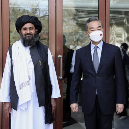 Chinese Foreign Minister Wang Yi (right) meets with Mullah Abdul Ghani Baradar, the acting deputy prime minister of the Afghan Taliban’s government, in Kabul on March 24. A US advisory panel on China was told on Thursday that despite Beijing’s ambitions to boost its regional influence, it has confronted rising resistance from extremists. Photo: Xinhua via AP