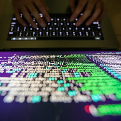 A programer shows a sample of decrypting source code in Taipei, Taiwan, on May 13, 2017. Photo: EPA