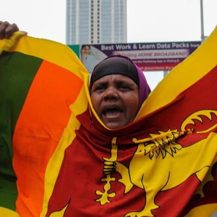 An anti-government demonstrator protests near the president’s office in Colombo. Photo: AFP 
