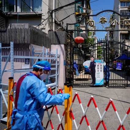 A residential area’s entrance is seen closed on May 5, 2022, as Shanghai remains under an extended Covid-19 lockdown. Photo: Reuters