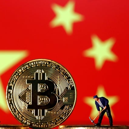 Small toy figurines seen on representations of the cryptocurrency bitcoin in front of an image of China’s flag in this illustration picture on April 9, 2019. Photo: Reuters