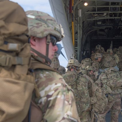 US Army soldiers assigned to the East Africa Response Force (EARF) board a transport plane in Camp Lemonnier, Djibouti in January 2020. Photo: US Air Force via Reuters