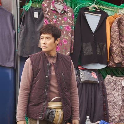 Lee Byung-hun as the angry merchant Lee Dong-seok in a still from Our Blues, a K-drama now showing on Netflix.