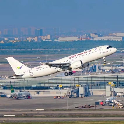 The first C919 large passenger aircraft to be delivered takes off from Shanghai Pudong International Airport on Saturday. Photo: Xinhua