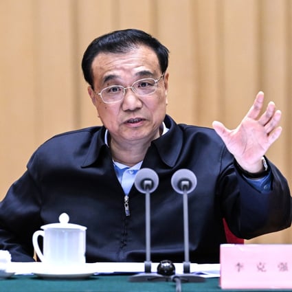 During a visit to Yunnan, Chinese Premier Li Keqiang, pictured without a mask,  stressed the Covid-hit economy needed urgent support. Photo: Xinhua
