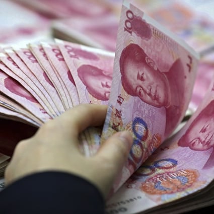 China’s one-year loan prime rate (LPR) was held at 3.7 per cent, the People’s Bank of China (PBOC) said on Friday, while the five-year LPR used as a reference for mortgages was cut from 4.6 per cent to 4.45 per cent. Photo: AP