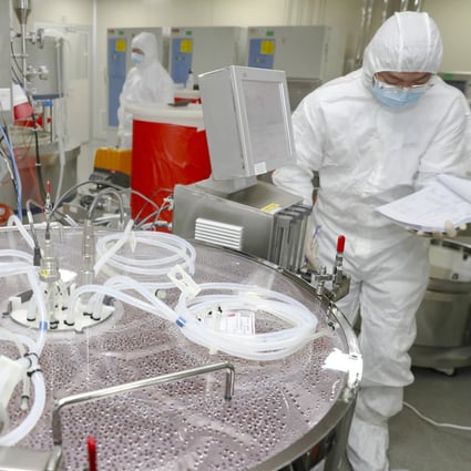 A CanSino Biologics employee works on the production of the recombinant Covid-19 vaccine in September. Photo: Getty Images