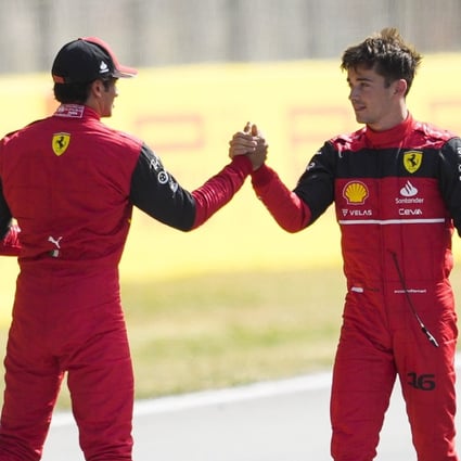 Ferrari’s Charles Leclerc (C) celebrates with teammate Carlos Sainz (left) after taking pole at the Spanish Grand Prix. Photo: EPA-EFE