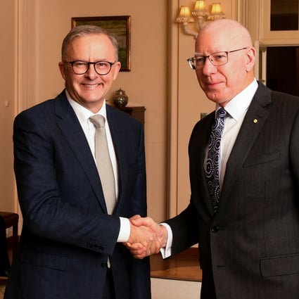 Newly sworn-in Australian Prime Minister Anthony Albanese shakes hands with Australian Governor-General David Hurley in Canberra, Australia. Photo: Reuters