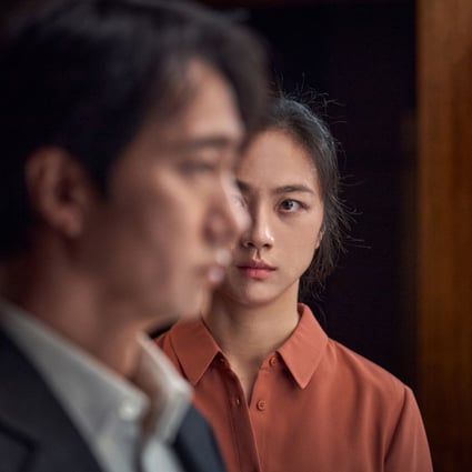 Tang Wei (right) and Park Hae-il in a still from Decision to Leave, directed by Park Chan-wook, which is playing in the main competition at the 2022 Cannes Film Festival.