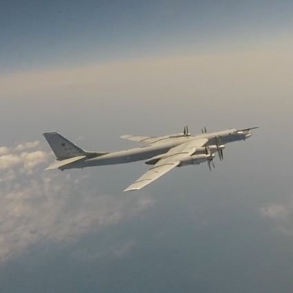 A Russian Tu-95 strategic bomber flies during Russian-Chinese military aerial exercises to patrol the Asia-Pacific regionin this still image taken from a video released on May 24, 2022. Photo: Russian Defence Ministry