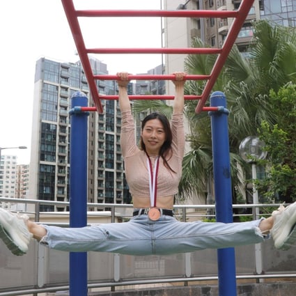 Hong Kong gymnast Angel Wong, showing off her medal from her last visit to Doha, is looking forward to another competition there. Photo: Shirley Chui
