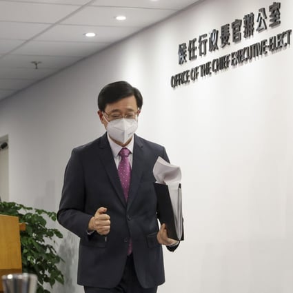 John Lee leaves the Press Room of the Office of the Chief Executive-elect at Immigration Tower in Wan Chai on May 17, after speaking to media representatives about plans for the government restructuring. Photo: Nora Tam