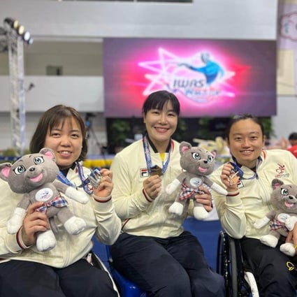Hong Kong’s Alison Yu (centre), Irene Chung (left), and Chan Yui-chong (right) pose with their medals in Thailand. Photos: Handout