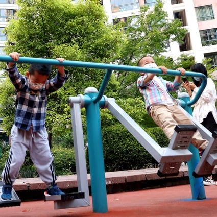 Children at the playground of a residential community in the Putuo district of Shanghai on May 17, 2022. Photo: Xinhua