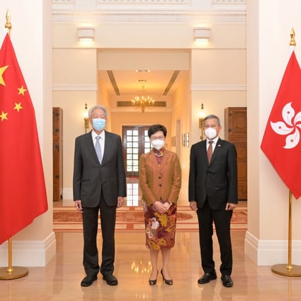 Singapore’s Senior Minister and Coordinating Minister for National Security Teo Chee Hean (left) and Minister for Foreign Affairs Vivian Balakrishnan meet with Hong Kong Chief Executive Carrie Lam at Government House on May 30. Photo: Handout