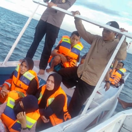 Thirty-one people have been rescued and 11 are still missing after a ferry ran out of fuel and sank in bad weather off the coast of Indonesia. Photo: Indonesia Search and Rescue Handout/AFP
